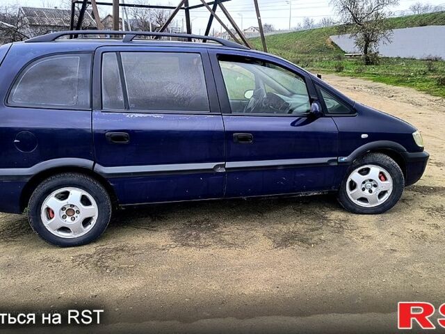 Синий Опель Зафира, объемом двигателя 2 л и пробегом 333 тыс. км за 1200 $, фото 3 на Automoto.ua