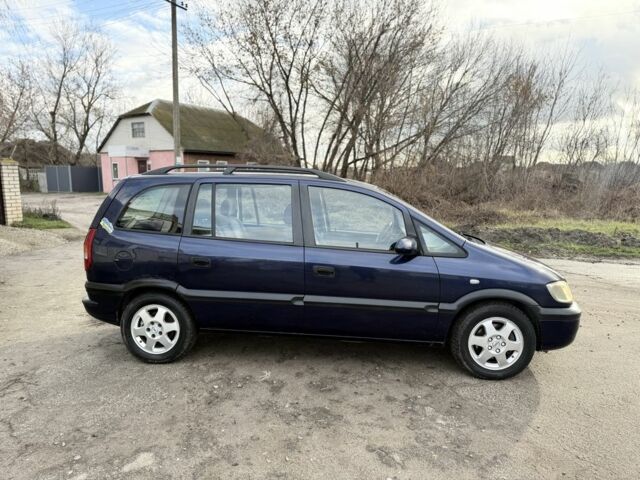 Синий Опель Зафира, объемом двигателя 2 л и пробегом 200 тыс. км за 1950 $, фото 3 на Automoto.ua