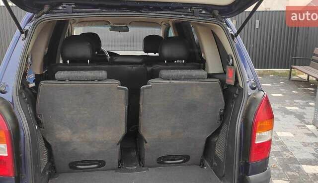 Синий Опель Зафира, объемом двигателя 2 л и пробегом 260 тыс. км за 3200 $, фото 1 на Automoto.ua