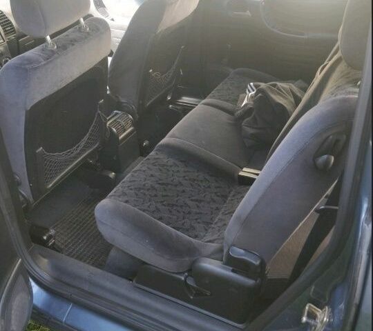 Синий Опель Зафира, объемом двигателя 2 л и пробегом 280 тыс. км за 3200 $, фото 2 на Automoto.ua