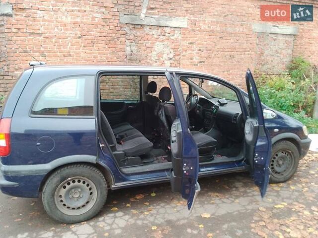 Синий Опель Зафира, объемом двигателя 1.6 л и пробегом 283 тыс. км за 3700 $, фото 4 на Automoto.ua