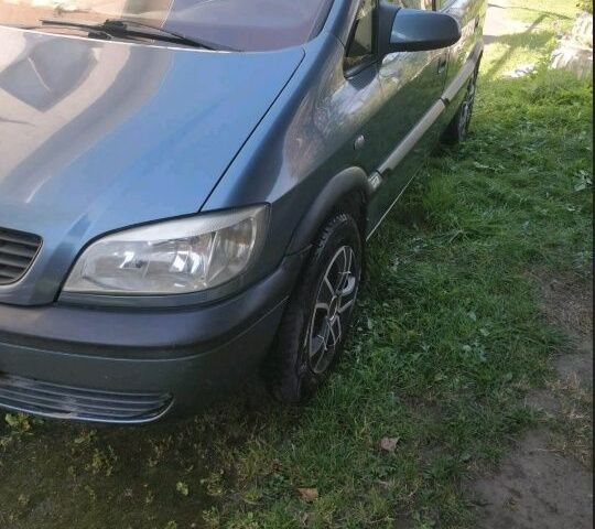 Синий Опель Зафира, объемом двигателя 2 л и пробегом 280 тыс. км за 3200 $, фото 4 на Automoto.ua