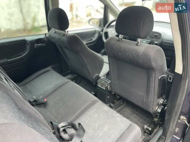 Синий Опель Зафира, объемом двигателя 1.6 л и пробегом 290 тыс. км за 2900 $, фото 18 на Automoto.ua