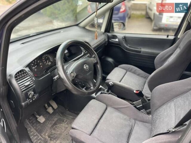 Синий Опель Зафира, объемом двигателя 1.6 л и пробегом 290 тыс. км за 2900 $, фото 14 на Automoto.ua