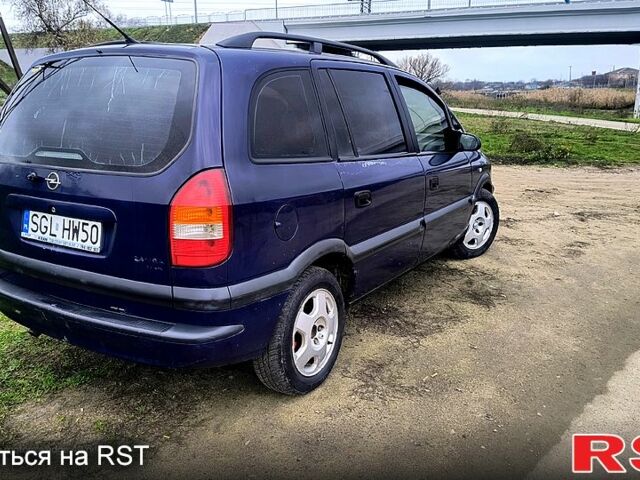 Синий Опель Зафира, объемом двигателя 2 л и пробегом 333 тыс. км за 1200 $, фото 4 на Automoto.ua