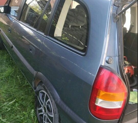 Синий Опель Зафира, объемом двигателя 2 л и пробегом 280 тыс. км за 3200 $, фото 1 на Automoto.ua