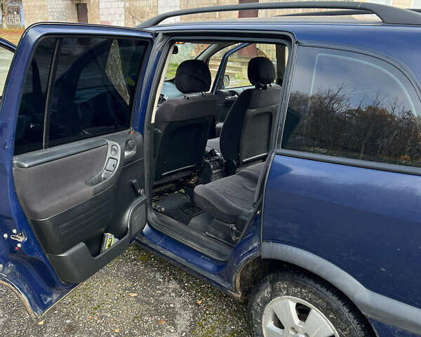 Синий Опель Зафира, объемом двигателя 2 л и пробегом 343 тыс. км за 3400 $, фото 5 на Automoto.ua