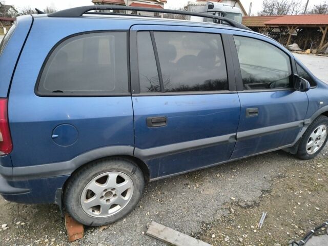 Синий Опель Зафира, объемом двигателя 2 л и пробегом 300 тыс. км за 1000 $, фото 1 на Automoto.ua