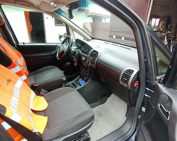 Синий Опель Зафира, объемом двигателя 1.6 л и пробегом 270 тыс. км за 4000 $, фото 29 на Automoto.ua