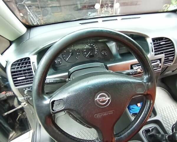 Синий Опель Зафира, объемом двигателя 1.6 л и пробегом 270 тыс. км за 4000 $, фото 26 на Automoto.ua