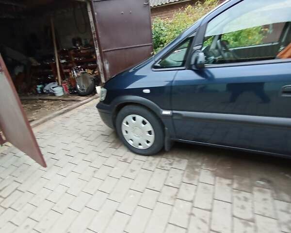 Синий Опель Зафира, объемом двигателя 1.6 л и пробегом 270 тыс. км за 4000 $, фото 36 на Automoto.ua