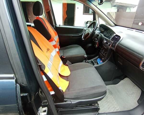 Синий Опель Зафира, объемом двигателя 1.6 л и пробегом 270 тыс. км за 4000 $, фото 32 на Automoto.ua