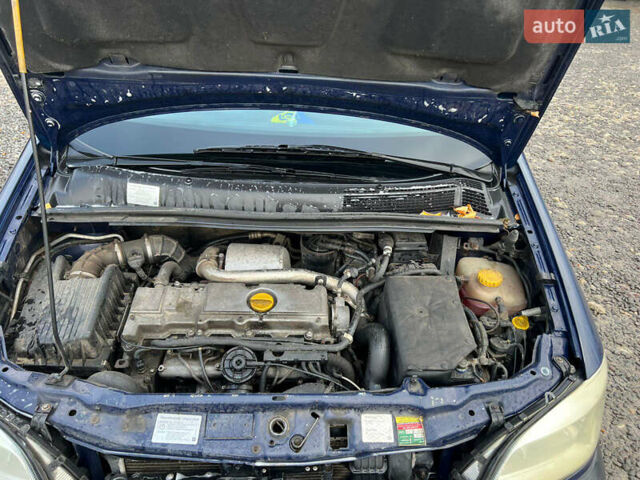 Синий Опель Зафира, объемом двигателя 2 л и пробегом 343 тыс. км за 3400 $, фото 18 на Automoto.ua
