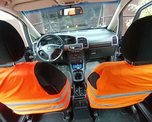 Синий Опель Зафира, объемом двигателя 1.6 л и пробегом 270 тыс. км за 4000 $, фото 14 на Automoto.ua