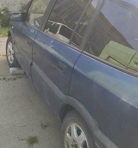 Синий Опель Зафира, объемом двигателя 2 л и пробегом 300 тыс. км за 959 $, фото 1 на Automoto.ua