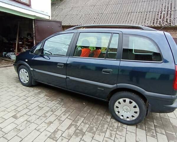 Синий Опель Зафира, объемом двигателя 1.6 л и пробегом 270 тыс. км за 4000 $, фото 37 на Automoto.ua