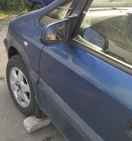 Синий Опель Зафира, объемом двигателя 2 л и пробегом 300 тыс. км за 959 $, фото 2 на Automoto.ua