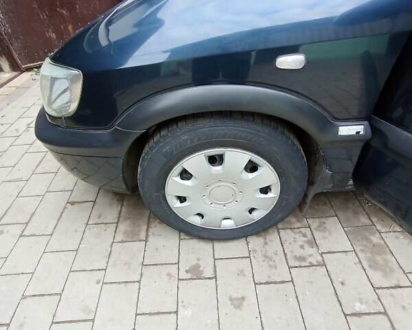 Синий Опель Зафира, объемом двигателя 1.6 л и пробегом 270 тыс. км за 4000 $, фото 12 на Automoto.ua