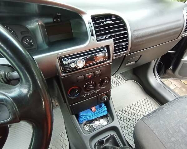 Синий Опель Зафира, объемом двигателя 1.6 л и пробегом 270 тыс. км за 4000 $, фото 24 на Automoto.ua