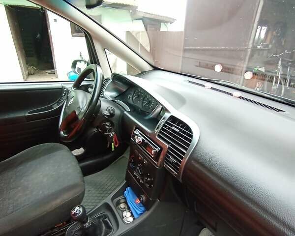 Синий Опель Зафира, объемом двигателя 1.6 л и пробегом 270 тыс. км за 4000 $, фото 27 на Automoto.ua