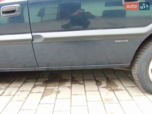 Синий Опель Зафира, объемом двигателя 1.6 л и пробегом 270 тыс. км за 4000 $, фото 4 на Automoto.ua