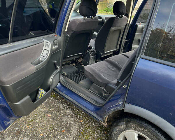 Синий Опель Зафира, объемом двигателя 2 л и пробегом 343 тыс. км за 3400 $, фото 2 на Automoto.ua