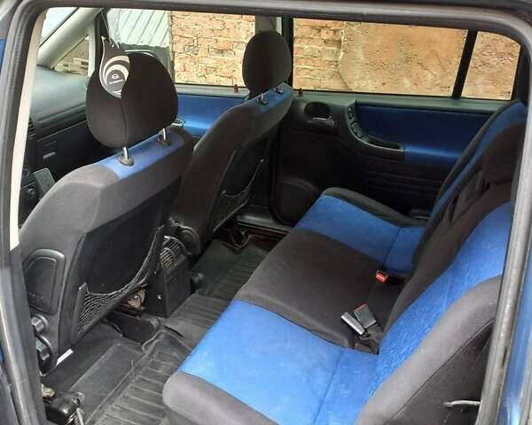 Синий Опель Зафира, объемом двигателя 2.2 л и пробегом 312 тыс. км за 4000 $, фото 19 на Automoto.ua