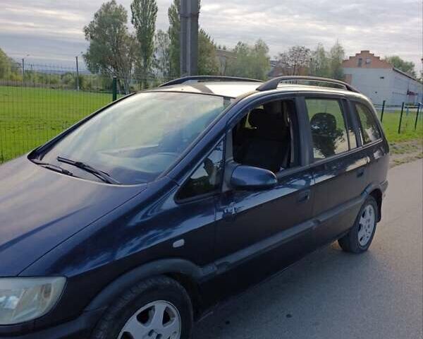 Синий Опель Зафира, объемом двигателя 1.99 л и пробегом 330 тыс. км за 3800 $, фото 3 на Automoto.ua