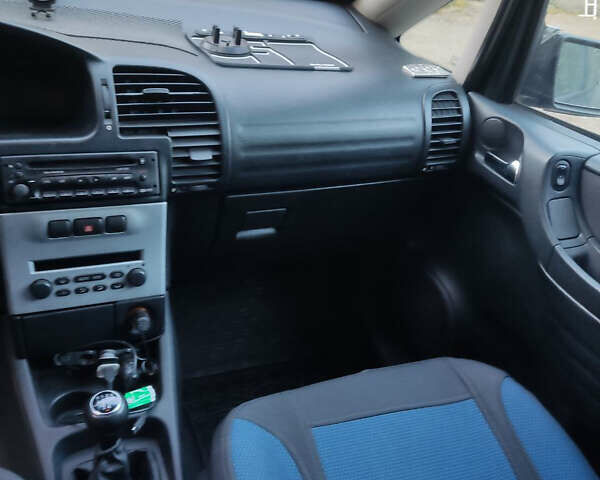 Синий Опель Зафира, объемом двигателя 1.8 л и пробегом 207 тыс. км за 4500 $, фото 4 на Automoto.ua