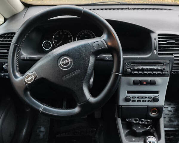 Синий Опель Зафира, объемом двигателя 1.8 л и пробегом 207 тыс. км за 4500 $, фото 5 на Automoto.ua