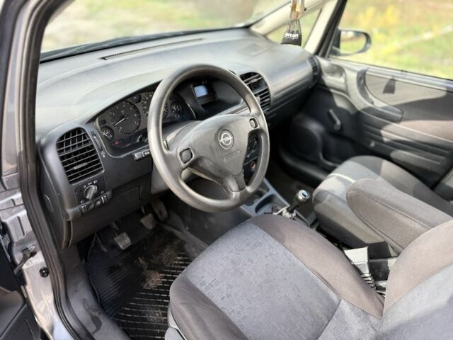 Синий Опель Зафира, объемом двигателя 1.8 л и пробегом 300 тыс. км за 1650 $, фото 7 на Automoto.ua