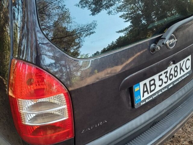 Синий Опель Зафира, объемом двигателя 1.8 л и пробегом 221 тыс. км за 4400 $, фото 3 на Automoto.ua