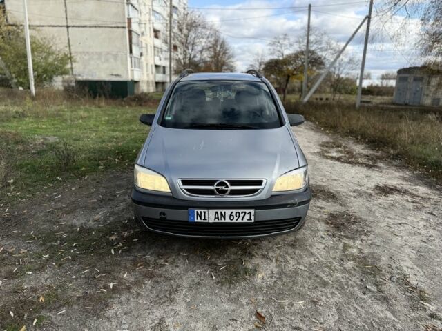 Синий Опель Зафира, объемом двигателя 1.8 л и пробегом 300 тыс. км за 1650 $, фото 2 на Automoto.ua