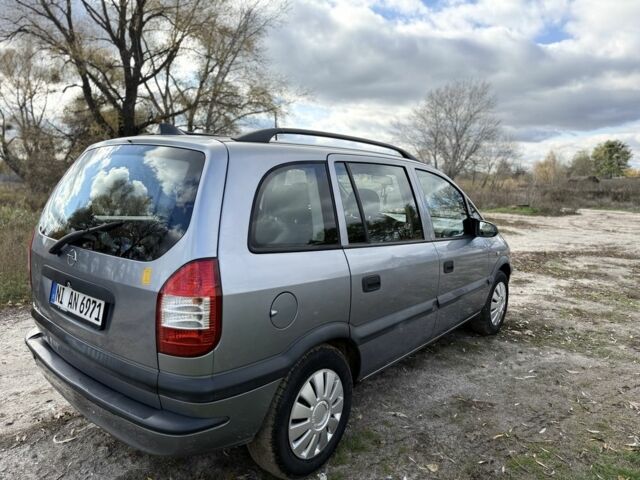 Синий Опель Зафира, объемом двигателя 1.8 л и пробегом 300 тыс. км за 1650 $, фото 3 на Automoto.ua