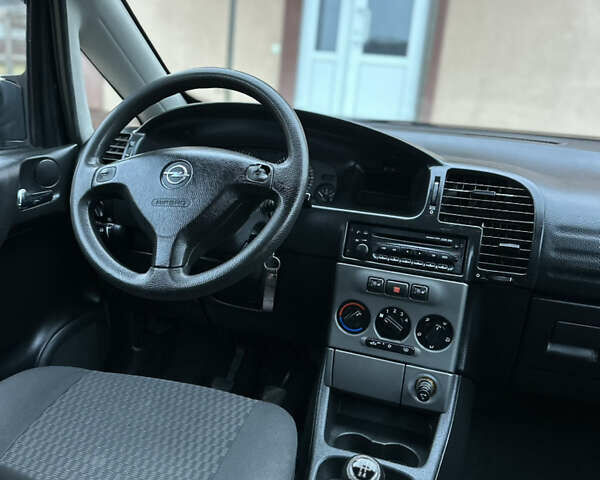 Синий Опель Зафира, объемом двигателя 1.6 л и пробегом 230 тыс. км за 3650 $, фото 45 на Automoto.ua