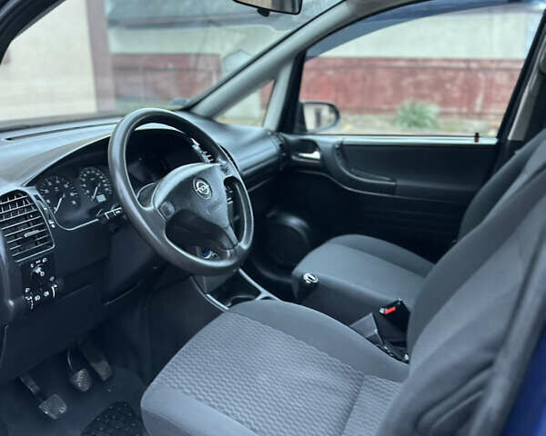 Синий Опель Зафира, объемом двигателя 1.6 л и пробегом 230 тыс. км за 3650 $, фото 49 на Automoto.ua