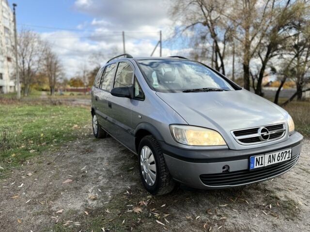 Синий Опель Зафира, объемом двигателя 1.8 л и пробегом 300 тыс. км за 1650 $, фото 1 на Automoto.ua