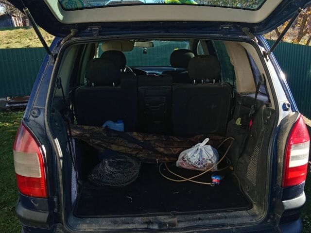 Синий Опель Зафира, объемом двигателя 2 л и пробегом 200 тыс. км за 2500 $, фото 6 на Automoto.ua