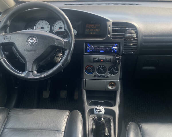 Синий Опель Зафира, объемом двигателя 2.17 л и пробегом 350 тыс. км за 4650 $, фото 9 на Automoto.ua