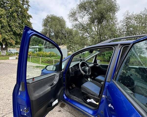 Синий Опель Зафира, объемом двигателя 2 л и пробегом 320 тыс. км за 4500 $, фото 5 на Automoto.ua