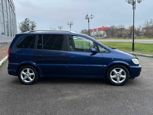 Синий Опель Зафира, объемом двигателя 2.2 л и пробегом 379 тыс. км за 3990 $, фото 3 на Automoto.ua