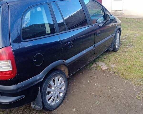 Синий Опель Зафира, объемом двигателя 2 л и пробегом 280 тыс. км за 4000 $, фото 1 на Automoto.ua