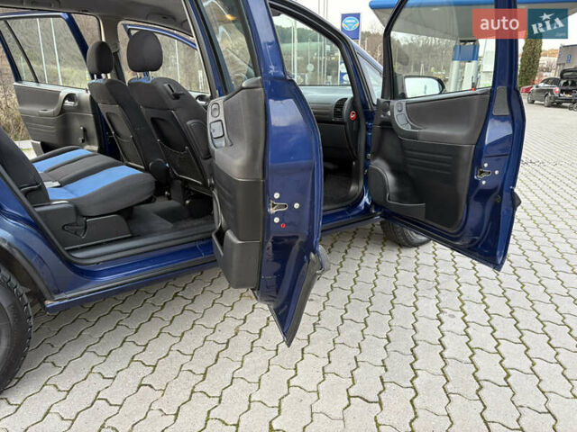 Синий Опель Зафира, объемом двигателя 1.8 л и пробегом 231 тыс. км за 3950 $, фото 29 на Automoto.ua