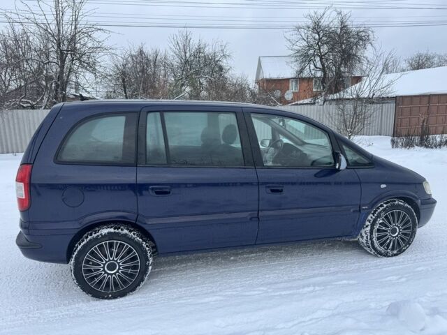 Синій Опель Зафіра, об'ємом двигуна 2 л та пробігом 300 тис. км за 2400 $, фото 1 на Automoto.ua