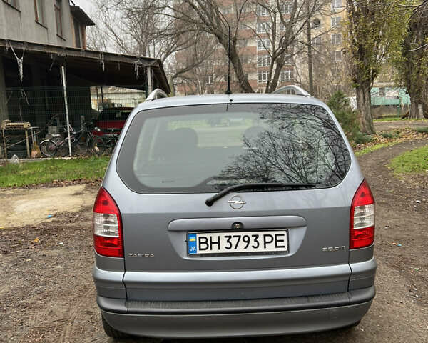 Синий Опель Зафира, объемом двигателя 2 л и пробегом 226 тыс. км за 4600 $, фото 3 на Automoto.ua