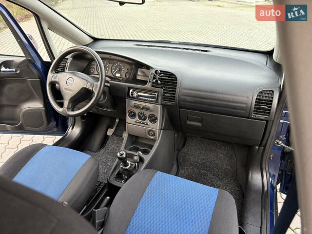 Синий Опель Зафира, объемом двигателя 1.8 л и пробегом 231 тыс. км за 3950 $, фото 31 на Automoto.ua