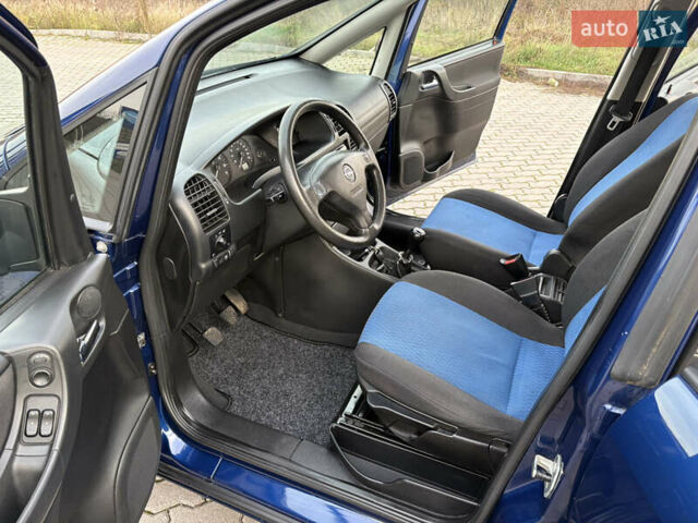 Синий Опель Зафира, объемом двигателя 1.8 л и пробегом 231 тыс. км за 3950 $, фото 9 на Automoto.ua