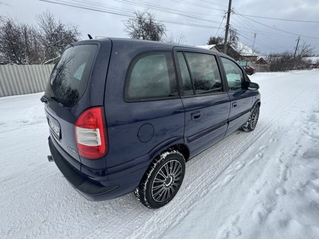 Синій Опель Зафіра, об'ємом двигуна 2 л та пробігом 300 тис. км за 2400 $, фото 10 на Automoto.ua