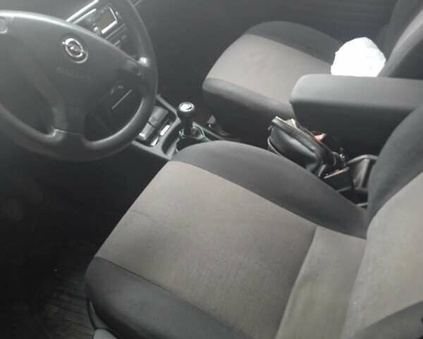 Синий Опель Зафира, объемом двигателя 1.6 л и пробегом 310 тыс. км за 4000 $, фото 4 на Automoto.ua