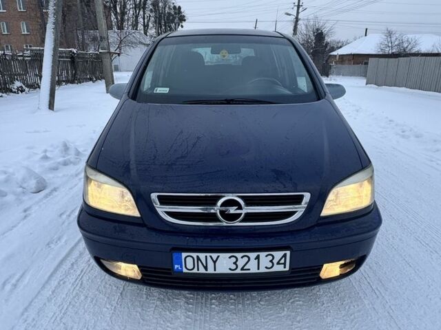 Синій Опель Зафіра, об'ємом двигуна 2 л та пробігом 300 тис. км за 2400 $, фото 5 на Automoto.ua